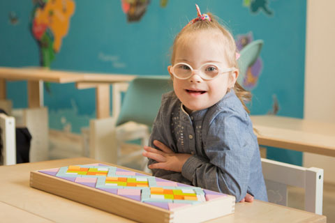 Young girl with special eyeglasses